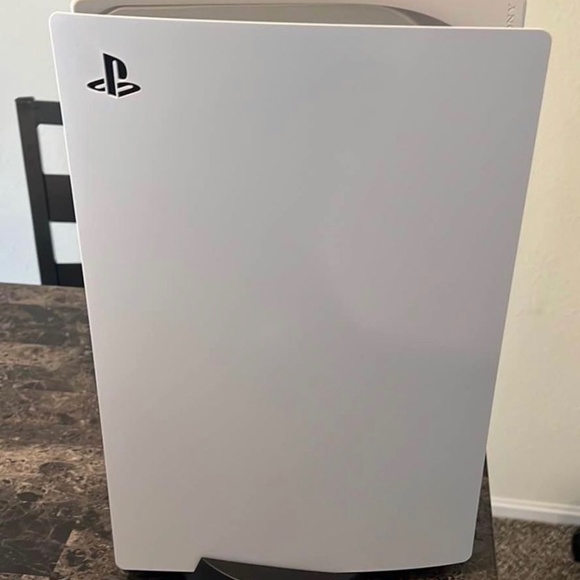 PS5 console with charging station